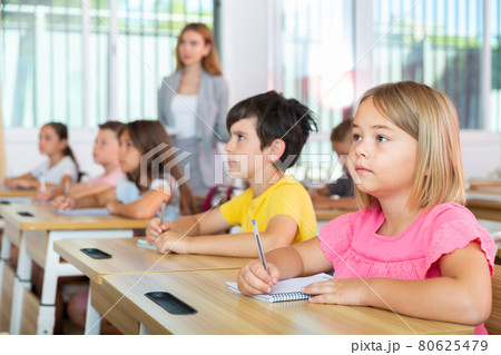 Kids studying in classroom Kids studying in classroom 80625479