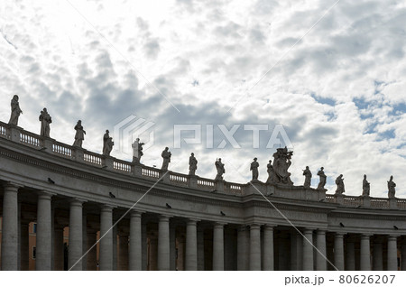 Details of the entablature with statues of religious saints on the colonnades of St. Peter's Basilica at St. Peter's Square in Vatican City, Rome, Italy Details of the entablature with statues of religious saints on the colonnades of St. Peter's Basilica at St. Peter's Square in Vatican City, Rome, Italy 80626207