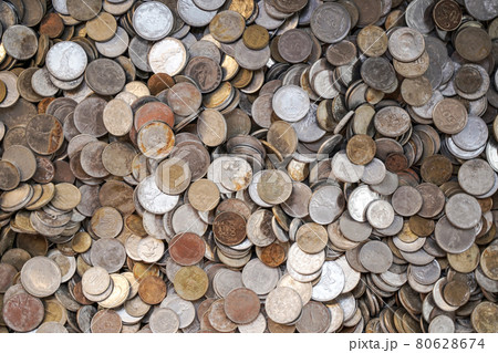 Old ancient coins background. Old ancient coins background. Many old copper coins in the chest as a symbol of wealth, money and treasure 80628674