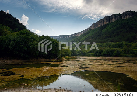Dark and Foggy lake with hills. after the rain 80630335