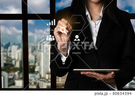 Digital marketing media in virtual icon globe shape business open his hand, working touch screen tablet in the office. Digital marketing media in virtual icon globe shape business open his hand, working touch screen tablet in the office. 80634394