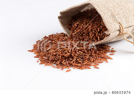 Heap of red rice 80635974