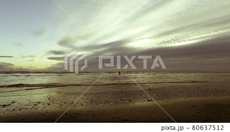 Sunset on Crosby Beach in winter, Crosby, Liverpool, United Kingdom Sunset on Crosby Beach in winter, Crosby, Liverpool, United Kingdom 80637512