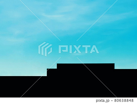 Abstract geometric silhouette of a building on a background of blue sky 80638848
