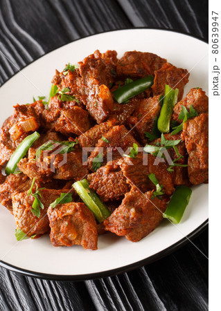 Tibs is a popular Ethiopian dish of sauteed beef 80639947