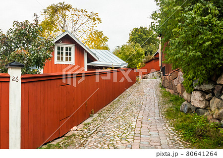 Street of Old Porvoo, Finland. Beautiful city autumn landscape with colorful wooden buildings. 80641264