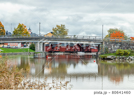 View of old Porvoo, Finland. Beautiful city autumn landscape with bridge and colorful wooden buildings. 80641460