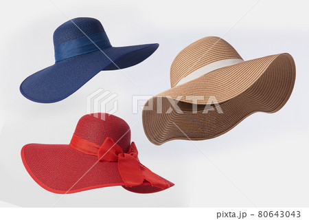 Vintage Panama hat, Woman hat isolated on white background, Women's beach hat, red hat, blue hat, yellow straw hat. Vintage Panama hat, Woman hat isolated on white background, Women's beach hat, red hat, blue hat, yellow straw hat. 80643043