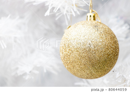 Gold color ball on white branch of chrismas tree background (Decoration for Christmas and New year festival) Gold color ball on white branch of chrismas tree background (Decoration for Christmas and New year festival) 80644059