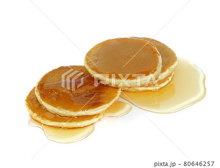 Stack of Pancakes top with honey on white background 80646257