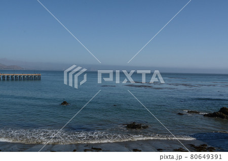 The Cayucos Pier on Cayucos State Beach at Estero bay on the Pacific Ocean in Cayucos, San Luis Obispo County, California The Cayucos Pier on Cayucos State Beach at Estero bay on the Pacific Ocean in Cayucos, San Luis Obispo County, California 80649391