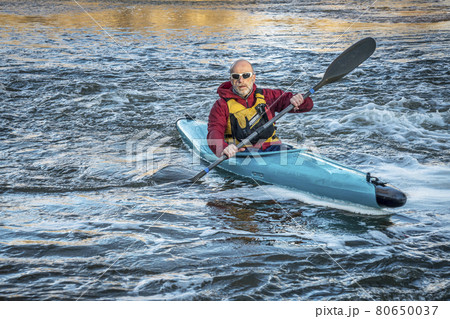 senior male paddler kayaking senior male paddler kayaking 80650037