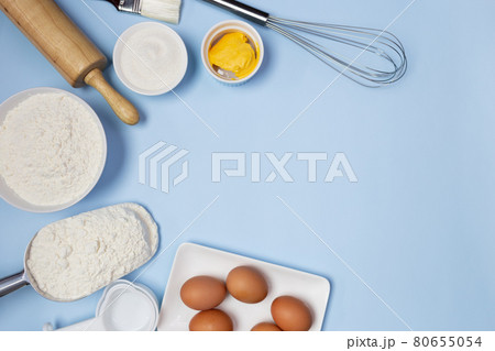 food ingredients on a blue background food ingredients on a blue background 80655054