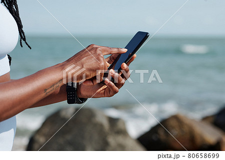 Jogger Installing Fitness Application 80658699