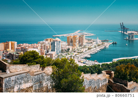 Malaga, Spain. Elevated View, Cityscape View Of Malaga, Spain. Old Fort Walls And Residential Houses 80660751