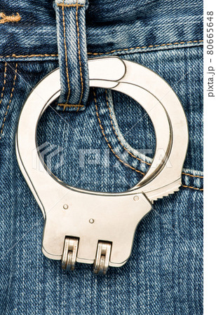 Handcuffs on jeans 80665648