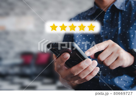 Man hand holding use mobile phone icon Stars Rating 5 star excellent rating or commenting service. Social concept. Man hand holding use mobile phone icon Stars Rating 5 star excellent rating or commenting service. Social concept. 80669727