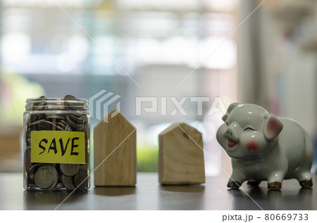 Investment and finance business concept. Saving money to invest or buy real estate in retirement Investment and finance business concept. Saving money to invest or buy real estate in retirement 80669733