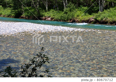 The Azusa River in Kamikochi, a highland valley inside the Chubu-Sangaku National Park in the Hida Mountains range of the northern Japanese Alps in Nagano Prefecture, Japan. The Azusa River in Kamikochi, a highland valley inside the Chubu-Sangaku National Park in the Hida Mountains range of the northern Japanese Alps in Nagano Prefecture, Japan. 80670712