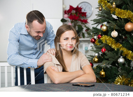 Man asking for forgiveness his wife 80671234