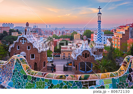 Barcelona city view from Guell Park. Sunrise view of colorful mosaic building in Park Guell 80672130