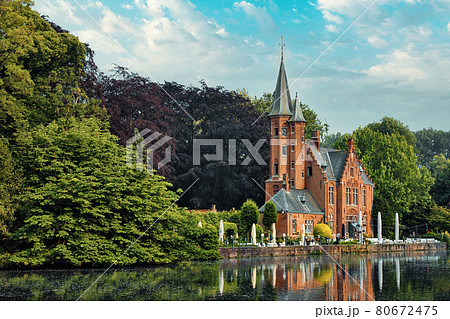 Kasteel Minnewater restaurant on Minnewater lake in Bruges, Belgium Kasteel Minnewater restaurant on Minnewater lake in Bruges, Belgium 80672475