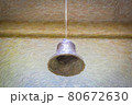 Illustrated image of a bell hanging in the house, warding off ghosts and evil spirits 80672630