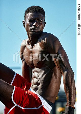 Fitness black man exercising workout on street ground, male model cross-training in urban environment. African guy twenty years old athlete trains on the street. Fitness black man exercising workout on street ground, male model cross-training in urban environment. African guy twenty years old athlete trains on the street. 80674653