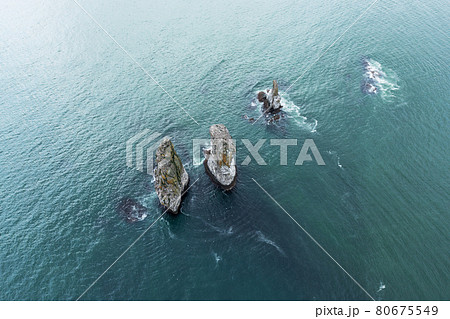 Three Brothers is a famous landmark in the Avacha Bay. Kamchatka Peninsula, Russia 80675549