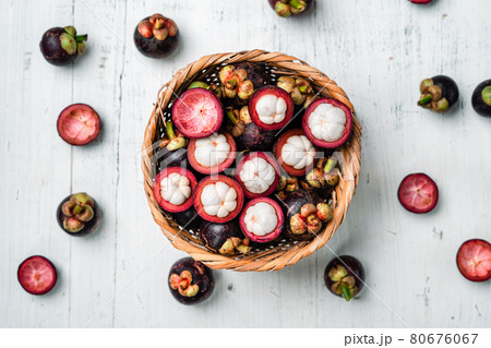 Mangosteen fruit on white wooden background 80676067