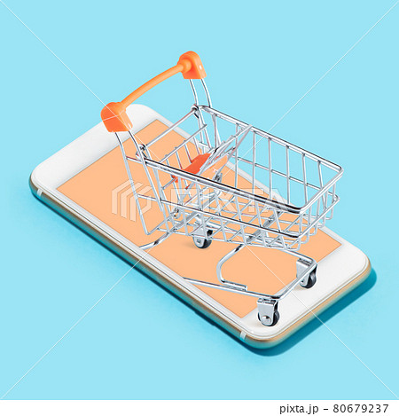Creative collage. Supermarket trolley standing on the smartphone screen over light blue background. 80679237