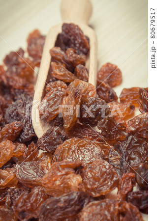 Fresh healthy raisins as source vitamins and minerals. Nutritious eating Fresh healthy raisins as source vitamins and minerals. Nutritious eating 80679517
