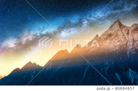 Milky Way and snowy mountains at starry night. Landscape Milky Way and snowy mountains at starry night. Landscape 80684857