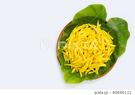 Preserved bamboo shoot in bamboo basket on white background. 80690111