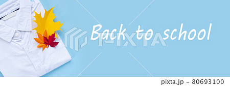 A white shirt with autumn leaves in the pocket. Back to school concept. 80693100