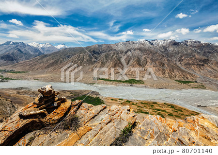 View of Spiti valley Himalayas with stone cairn . Spiti valley, Himachal Pradesh, India 80701140