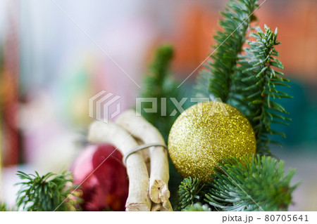 Christmas balls on a green branch of a Christmas tree. Holiday concept New Year. 80705641