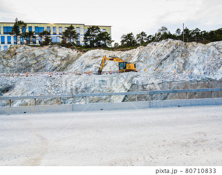 Heavy machine working on construction site, Norway 80710833