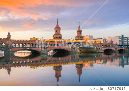 Berlin skyline with Oberbaum Bridge and Spree River, at sunrise Berlin skyline with Oberbaum Bridge and Spree River, at sunrise 80717015