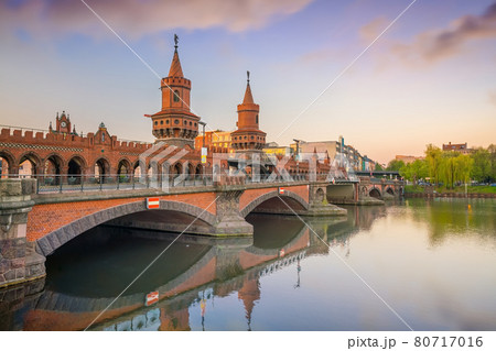 Berlin skyline with Oberbaum Bridge and Spree River, at sunrise Berlin skyline with Oberbaum Bridge and Spree River, at sunrise 80717016