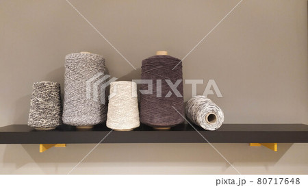 Roll of wool fiber threads, colors analogous to grey 80717648
