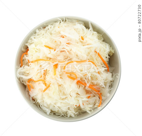 Bowl of tasty fermented cabbage isolated on white, top view 80722730