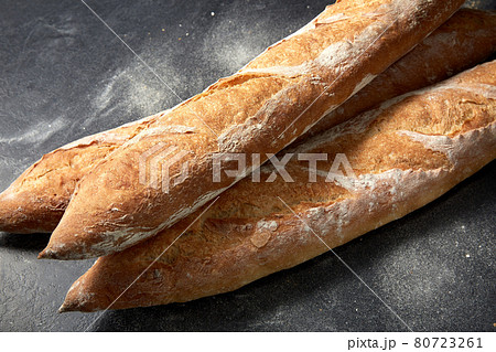 close up of baguette bread on table 80723261