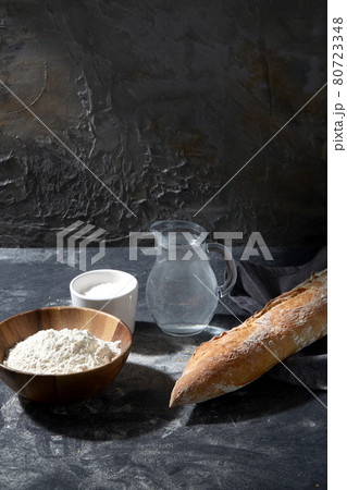 bread, wheat flour, salt and water in glass jug bread, wheat flour, salt and water in glass jug 80723348