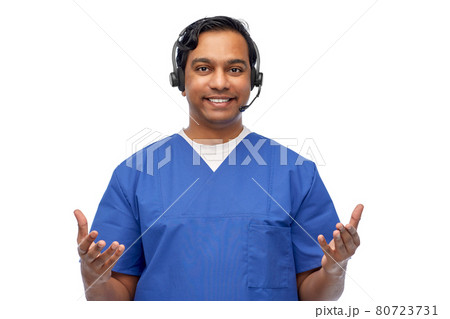 smiling indian doctor or male nurse with headset 80723731