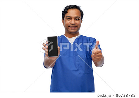 doctor or male nurse with phone showing thumbs up 80723735
