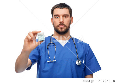 doctor or male nurse with medicine and stethoscope 80724110