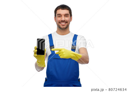 happy male worker or cleaner showing smartphone happy male worker or cleaner showing smartphone 80724634