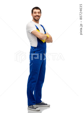 happy male worker or cleaner in overall and gloves happy male worker or cleaner in overall and gloves 80724635