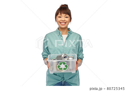smiling young asian woman sorting metallic waste smiling young asian woman sorting metallic waste 80725345